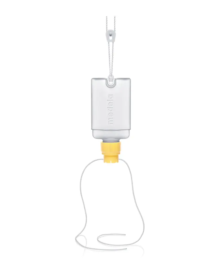 Supplemental Nursing System (SNS) SNS sistem za pomoć pri dojenju sadrži: uzica za držanje oko vrata, bočica za hranjenje,  tri veličine cijevi (svaka u paru): crvena, bijela i prozirna, držač ventila,                 nastavak na bocu u obliku prstena, po